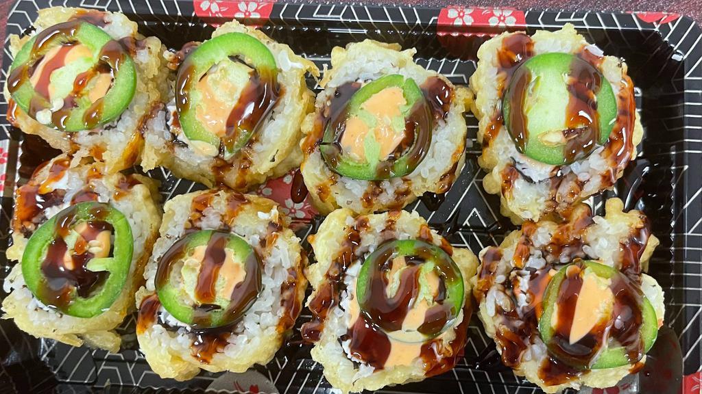 Fire Cracker Roll · Spicy. Deep fried crab meat and cream cheese topped with jalapeño, eel sauce and spicy mayo.