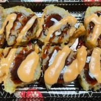 Samurai Roll · Deep fried shrimp tempura,crab stick,and cream cheese,topped spicy tuna,eel sauce and spicy ...