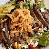 Steak Salad · You've been asking for it, so we made it delcious.  Served with an A1 vinaigrette.