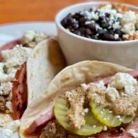 Cuban Pig Tacos · Have you ever had a Cuban sandwich in taco form?  We made it happen!  Our famous pulled pork...