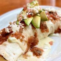 Breakfast Burrito · We put all your favorite breakfast foods in one place:  scrambled eggs, choice of meat, blac...