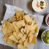 Chips & Dips · Corn tortilla chips, housemade guacamole, Queso Blanco & salsa (traditional or jalapeño).