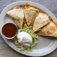 Triple Decker Quesadilla · Choice of grilled chicken, picadillo beef, house-made pulled pork or grilled veggies layered...