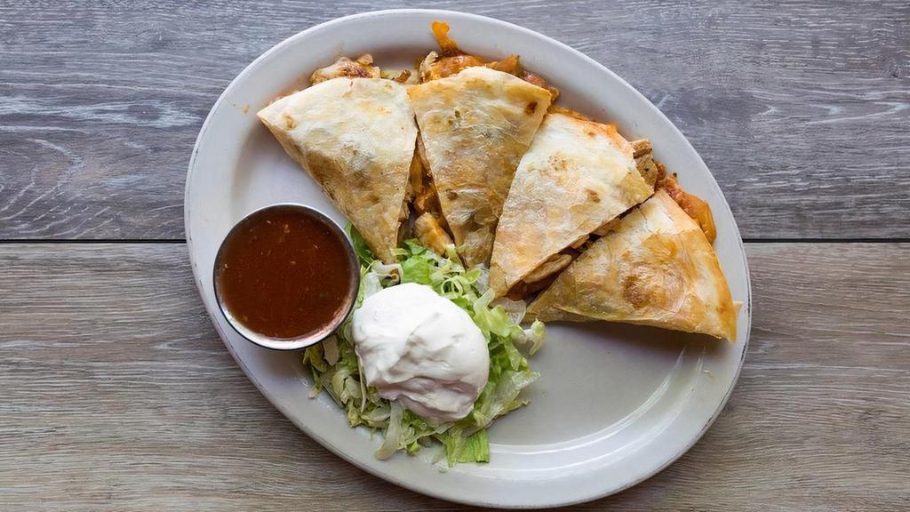 Triple Decker Quesadilla · Choice of grilled chicken, picadillo beef, house-made pulled pork or grilled veggies layered with spicy stewed tomatoes, onions & poblano peppers with jack & cheddar cheese. Served with sour cream & salsa,