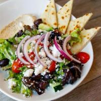 Greek Salad · Kalamata olives, red onions, cucumbers, cherry tomatoes and feta cheese on mixed greens topp...