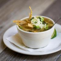 Cup Tortilla Soup · Our take on chicken tortilla soup topped with jack cheese, diced avocado, cilantro, and seas...