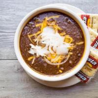 Bowl Texas Chili · Traditional, mild, all-beef-no-beans chili topped with shredded Cheddar cheese and diced oni...