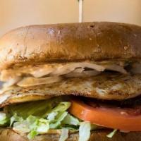 The Original Chicken Sandwich · All-natural grilled chicken breast, lettuce, tomatoes, onions, and pickles with house- made ...
