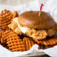 Chicken Fried Chicken Sandwich · All-natural chicken breast deep fried in Shiner Bock beer batter, topped with melted Swiss c...