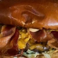 Bacon Cheddar · Bacon, cheddar cheese, lettuce, tomatoes, onions & pickles with house made chipotle mayo wit...