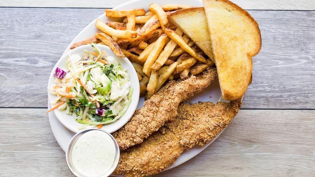 Texas Tortilla Catfish · Catfish filet battered & golden fried in our signature crushed seasoned tortilla chip breading with jalapeño tartar sauce, lime wedges, Texas toast & your choice of two sides.  We recommend hand-cut french fries & coleslaw.