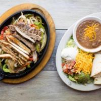 Fajitas For One · Marinated fajita chicken, beef, or veggies with grilled onions and bell peppers, served with...