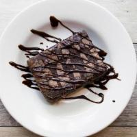 Oh Fudge! Chocolate Brownie · Warm chocolate chip brownie, chocolate syrup, caramel & whipped cream.