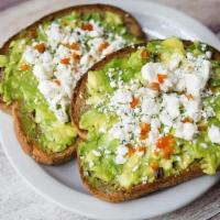 Avocado Toast · Whole wheat toast topped with smashed avocado and olive oil, sprinkled with feta cheese & re...