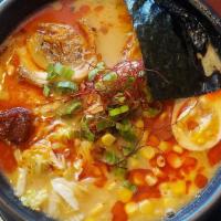 Spicy Miso Ramen · Spicy. Spicy and lightly sweetened creamy pork broth with miso flavor, sweet corn, Napa cabb...