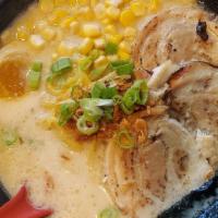 Tonkotsu Ramen · Creamy and silky pork broth soup with sweet corn, Napa cabbage, green onions, seaweed, and h...