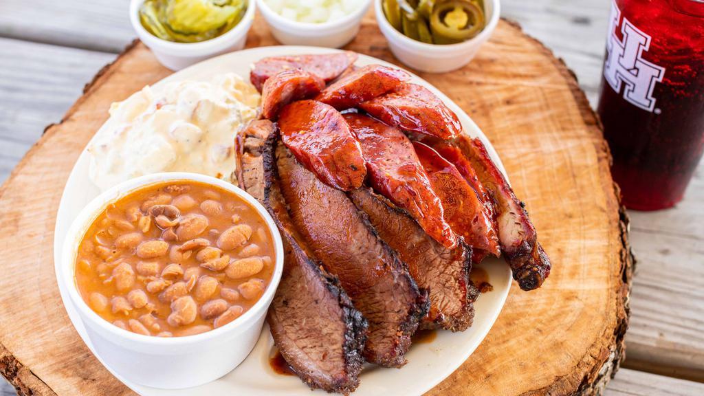 3 Meat Plate · Choice of any 3 Meats. Includes 2 sides, Bread, and Drink.