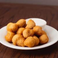 Breaded Mushrooms · Served with ranch dressing.