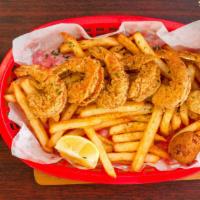 Shrimp Snack · Four hand-battered jumbo shrimp served over a bed of fries and one hushpuppy. Substitute fri...