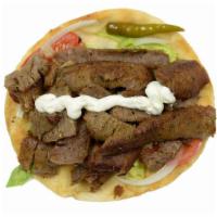 Gyro Wrap · Our famous Chicago style lamb and beef gyro. served with homemade tzatziki sauce, lettuce, o...