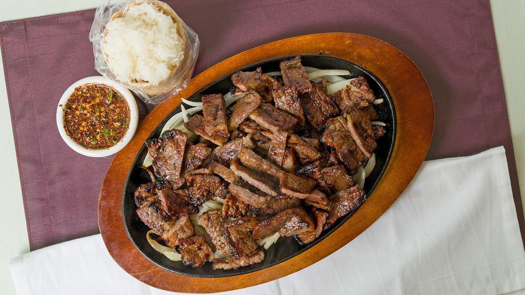 Tiger Cry Plate · Beef brisket marinated and grilled over open flame, served with the signature tiger cry sauce.