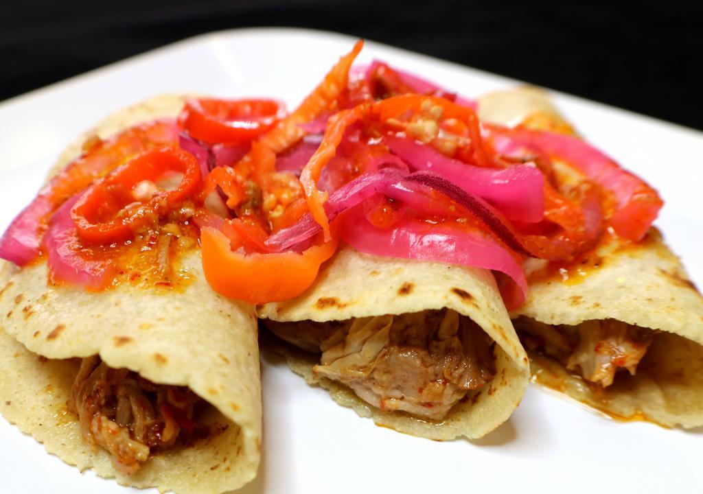 Tacos · De bistec, cochinita pibil, o tripa tortillas hechas a mano y regular. / Steak, cochinita pibil, or tripe tortillas handmade and regular.