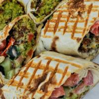 Classic Falafel · A mixture of chickpeas and fresh herbs fried into crispy pieces. Stuffed into pita bread wit...