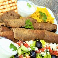 Gyro Plt · A plate of thin slices of mixed beef and lamb meat broiled over time, served with basmati ri...