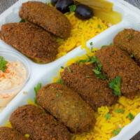 Falafel Plate · A mixture of chickpeas and fresh herbs fried into eight crispy pieces. Served with rice, sal...