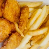 Chicken Nuggets · Fried breaded chicken with fries.