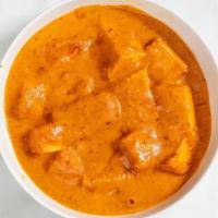 Tikka Masala · Creamy tomato onion sauce infused with aromatic Indian spices. Served with Basmati rice