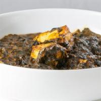 Saag(Spinach) · Minced spinach slowly cooked with onion, ginger, garlic, infused with Indian spices and crea...