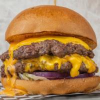 Omg! Stack Bueger · Two beef patties with melted American cheese, tomato, onions, pickles, and OMG sauce.