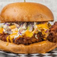 Nash Me Up Philly Chicken (Medium) · Marinated Fried Chicken dipped in Our Nashville medium level sauce, topped with cheese, crea...