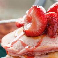 Strawberries N Cream Pancakes · It's summer time come indulge in these delicious strawberry pancakes topped with powdered su...