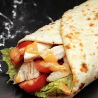 Chipotle Chicken Wrap · Grilled Chicken, Romaine Lettuce, Tomatoes, Ancho Chipotle Sauce