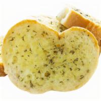 Garlic Breads X3 · Garlic Bread Sliced with Butter, Garlic and Parsley.
