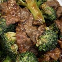 Beef With Broccoli 芥兰牛 · A strip of tender beef toss-cooked with broccoli carrot and bamboo shoots. served with egg r...