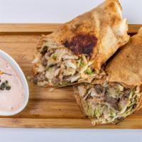 Shawarma · Option of beef, chicken or combo comes with beef sausage and with zephyrs chili sauce.