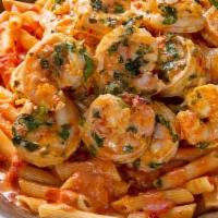 Seafood Pasta  · Pasta cooked in tomato sauce with lobster, mussel & shrimp