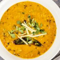 Tadka Dal · Gluten free. Lentils with tempered onion, garlic & ginger.
