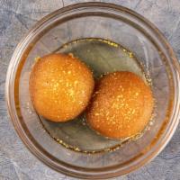 Gulab Jamun · Fried milk balls soaked in a sweet syrup.