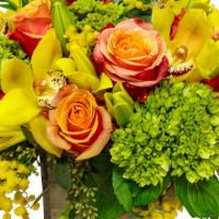 Cymbidium Fun · Look at this gorgeous arrangement with yellow cymbidiums and orange roses - just beautiful! ...