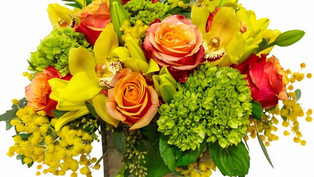 Cymbidium Fun · Look at this gorgeous arrangement with yellow cymbidiums and orange roses - just beautiful! Flowers and container subject to availability.