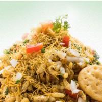 Bhel Puri · Puffed rice & sev mixed with potatoes, onions, chaat masala & chutney.