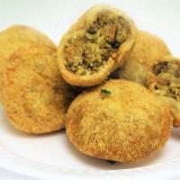 Lilva Kachori (6Pcs) · Toover liva mixed together with indian spices, fried & served with chutneys.