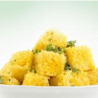 Khaman Dhokla  · A snack made up of rice & split chickpea batter.