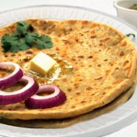 Aloo Paratha (2Pcs) · Whole wheat bread stuffed with a mixture of mashed potatoes & indian spices served with yogu...