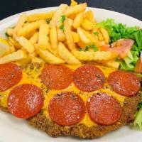 Milanesa Ala Pizza · Italian style milanesa with topped with homade tomato sauce, cheese, and pepronies and oréga...