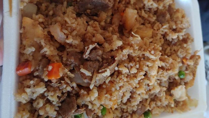 House Fried Rice · Served with carrot, green pea & onion.